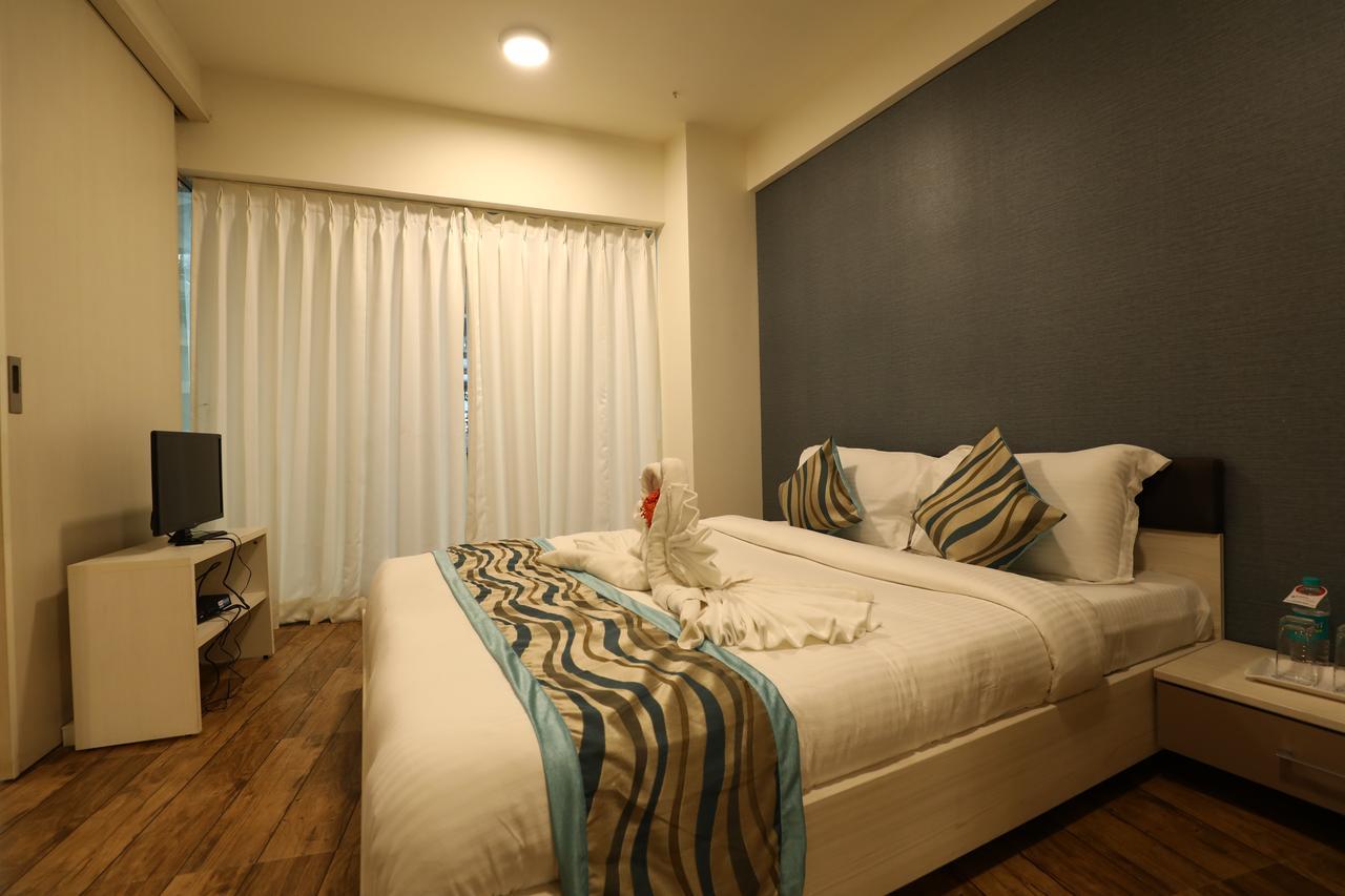 Rajhans Belliza Service Apartment スーラト エクステリア 写真